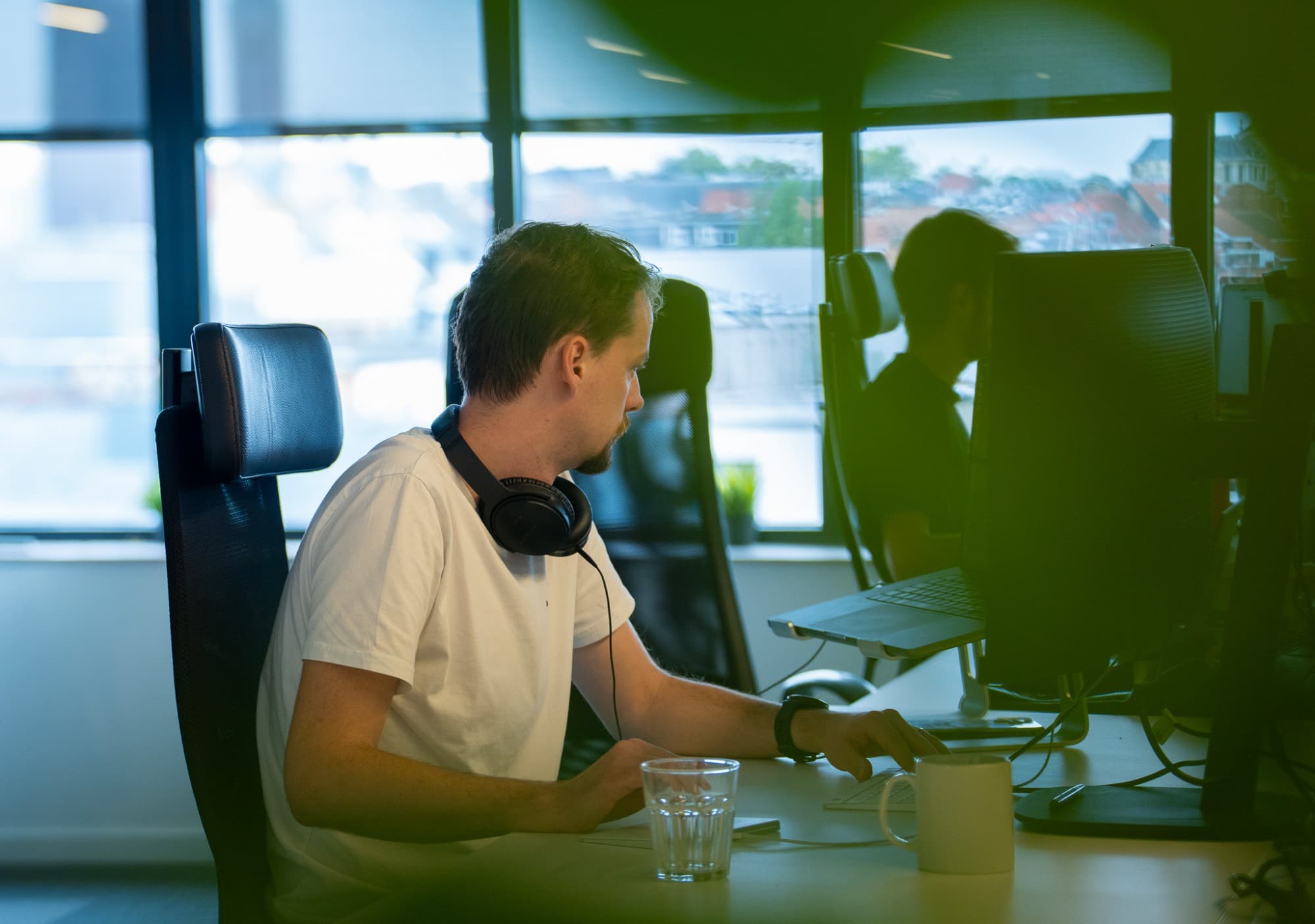 Thomas focused at his desk at Panenco