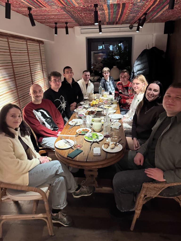 Panenco team sharing a meal together