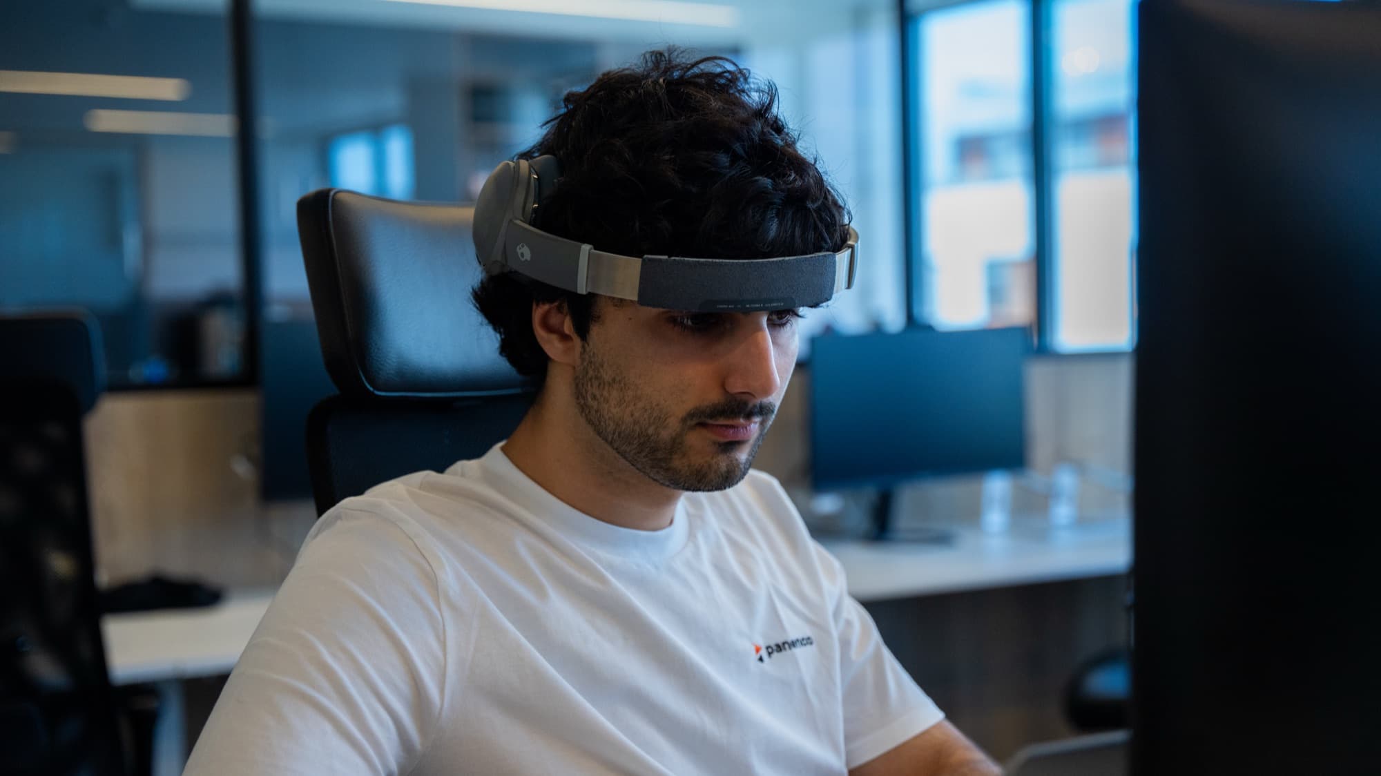 Panenco engineer working with a headset on